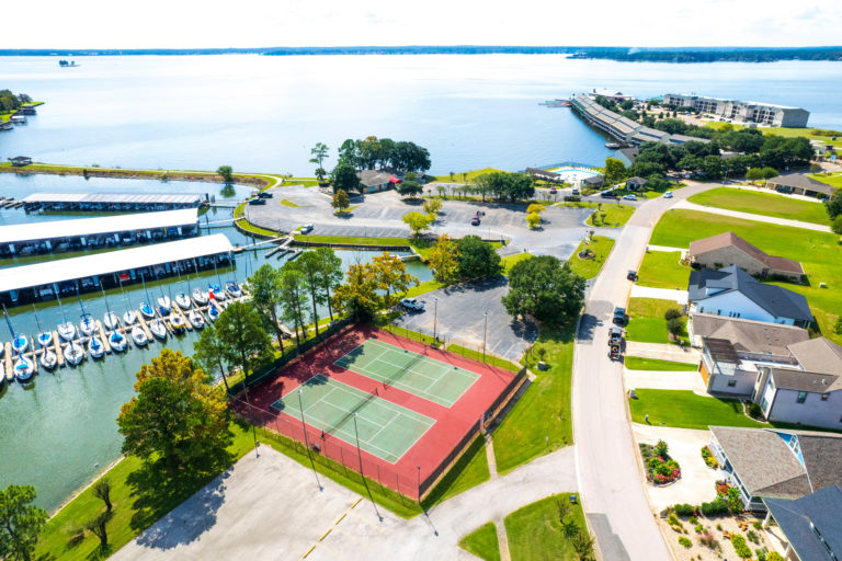 Photo of tennis court and boat dock. Aerial View