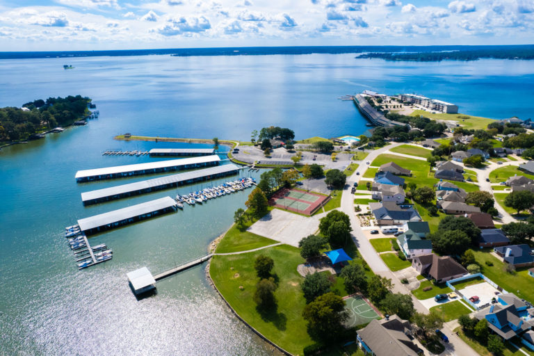 Photo of aerial view of the resort with tennis and basketball courts.